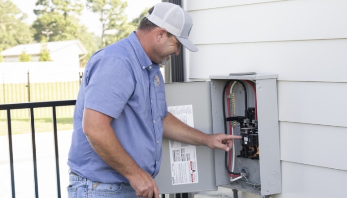 Technician With Outdoor Panel